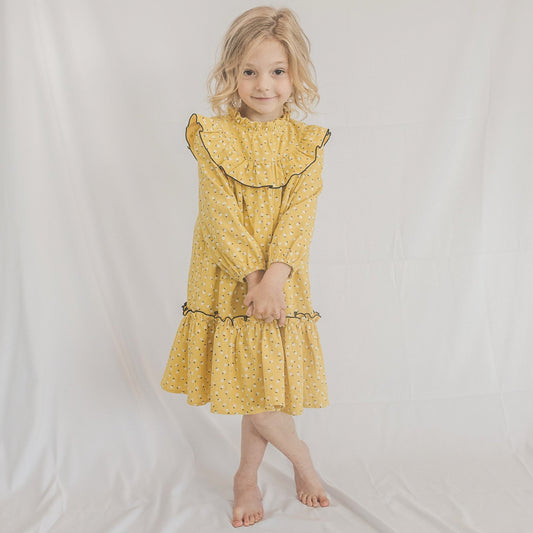 "Where Every Twirl is a Sunflower in Bloom" – Unveiling FITTEM's 'Sunflower Petal Twirl' Dress.