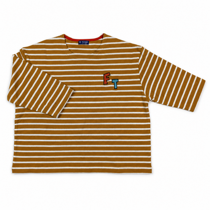 Brown and cream striped Modern Sailor Tee with red neckline trim, red F and teal T chest embroidery and one folded sleeve.
