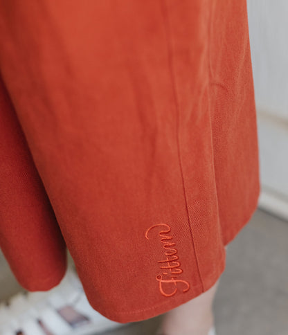 Fittem embroidery and hem detail on the rusty orange Easy Pant
