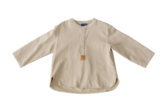 The ivory Urban Maverick Henley Tee is shown flat with a Henley-style button placket, brown accent and rounded hem.