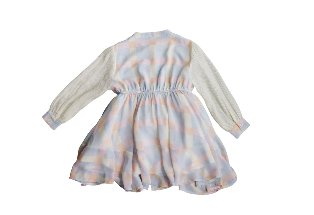 Twirl Me Dress back showing pastel plaid and textured cream sleeves